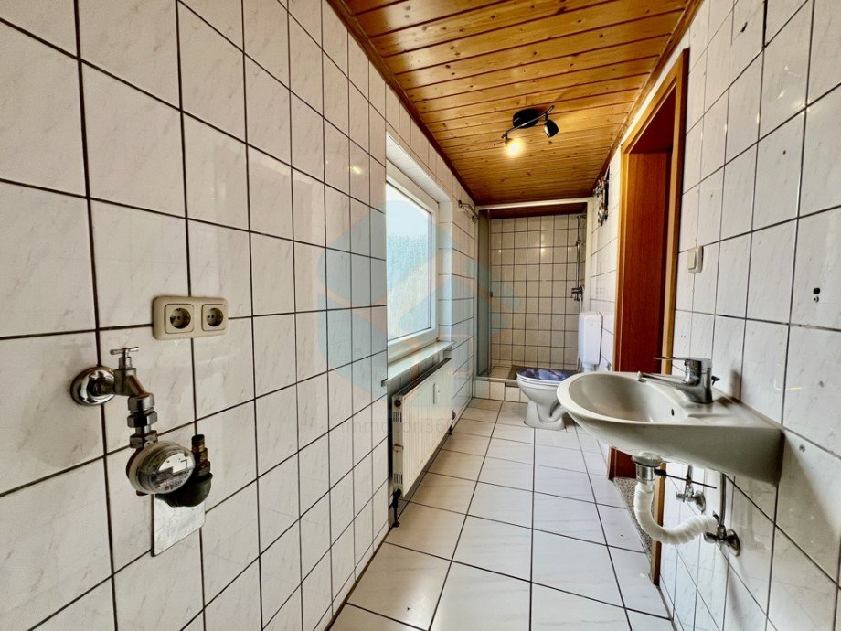 Bad OG Einfamilienhaus W�lfersheim / Wohnbach