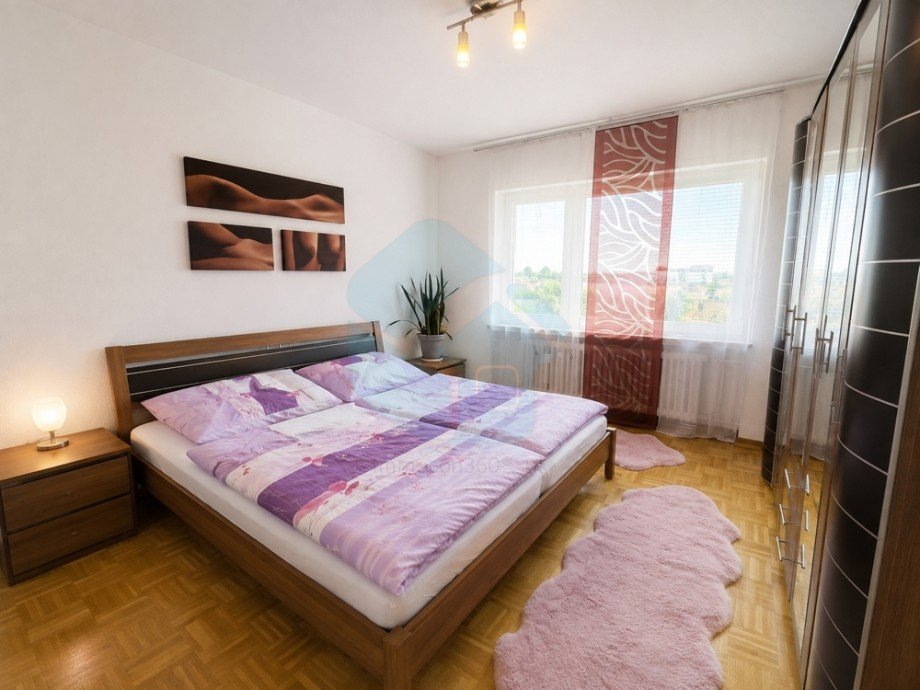 Schlafzimmer 1 DG Mehrfamilienhaus Butzbach / Griedel