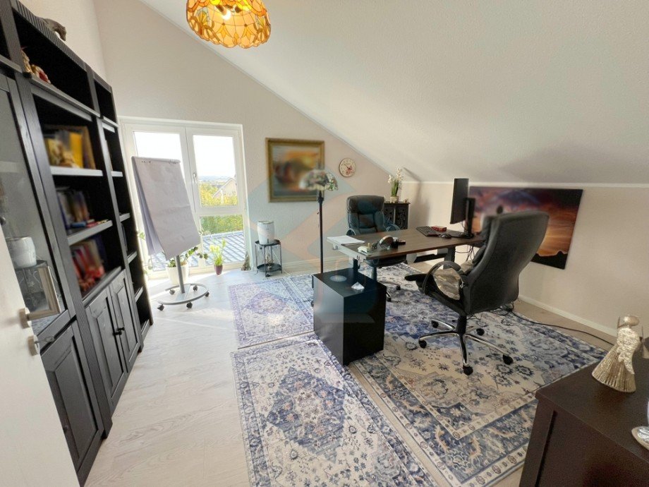 Schlafzimmer 1 Dachgeschoss Einfamilienhaus Butzbach / Griedel