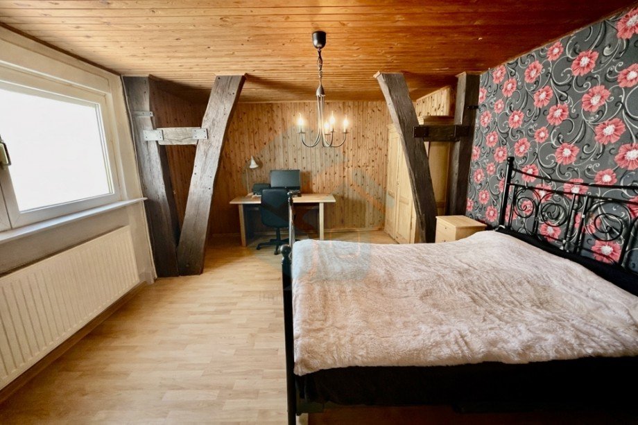 Schlafzimmer OG Haus links Einfamilienhaus W�lfersheim / Wohnbach