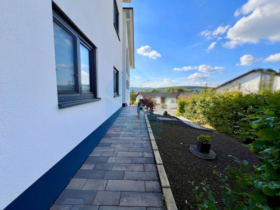 Seitenansicht Hauseingang Einfamilienhaus Butzbach / Griedel