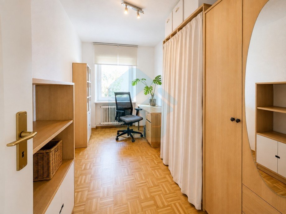 Schlafzimmer 2 DG Mehrfamilienhaus Butzbach / Griedel