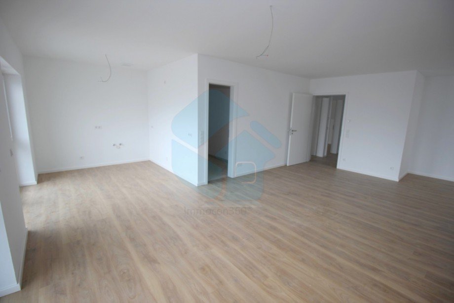 Wohnzimmer Ansicht zur K�che Penthousewohnung Friedberg