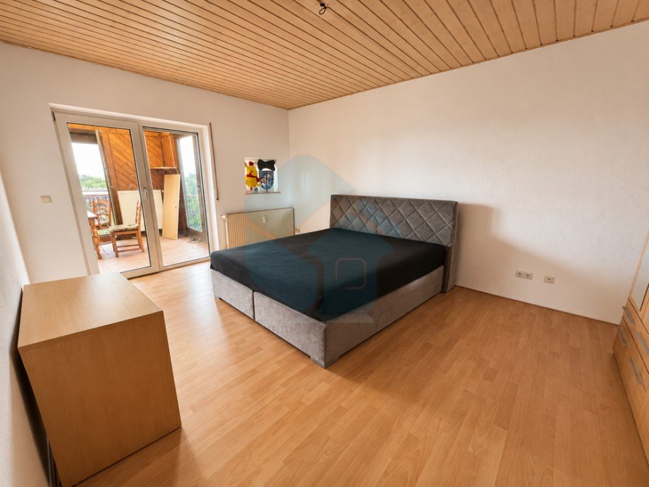 Schlafzimmer 1 Wohnung EG Mehrfamilienhaus W�lfersheim / Wohnbach