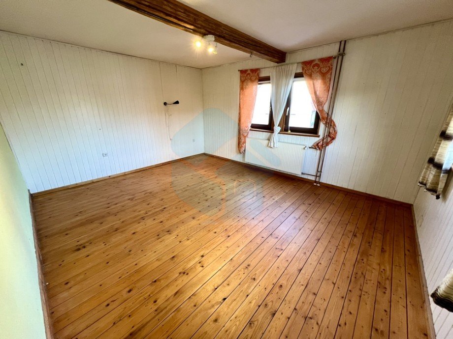 Schlafzimmer 2 OG Einfamilienhaus Butzbach / Hoch-Weisel