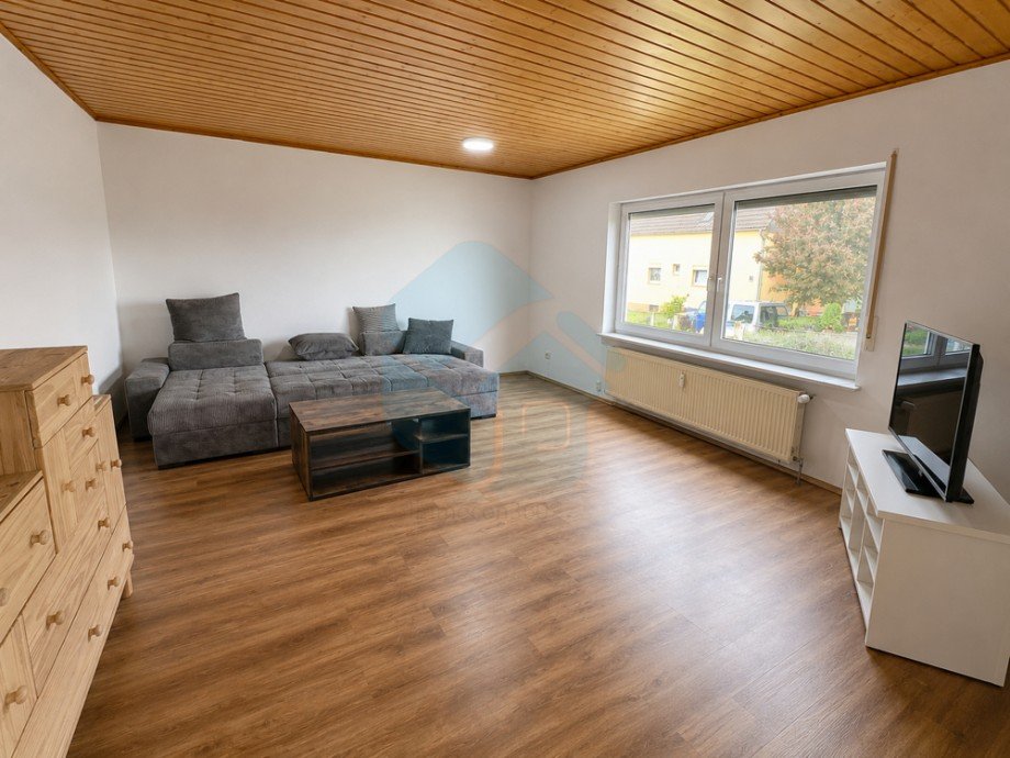 Wohnzimmer Wohnung EG Mehrfamilienhaus W�lfersheim / Wohnbach
