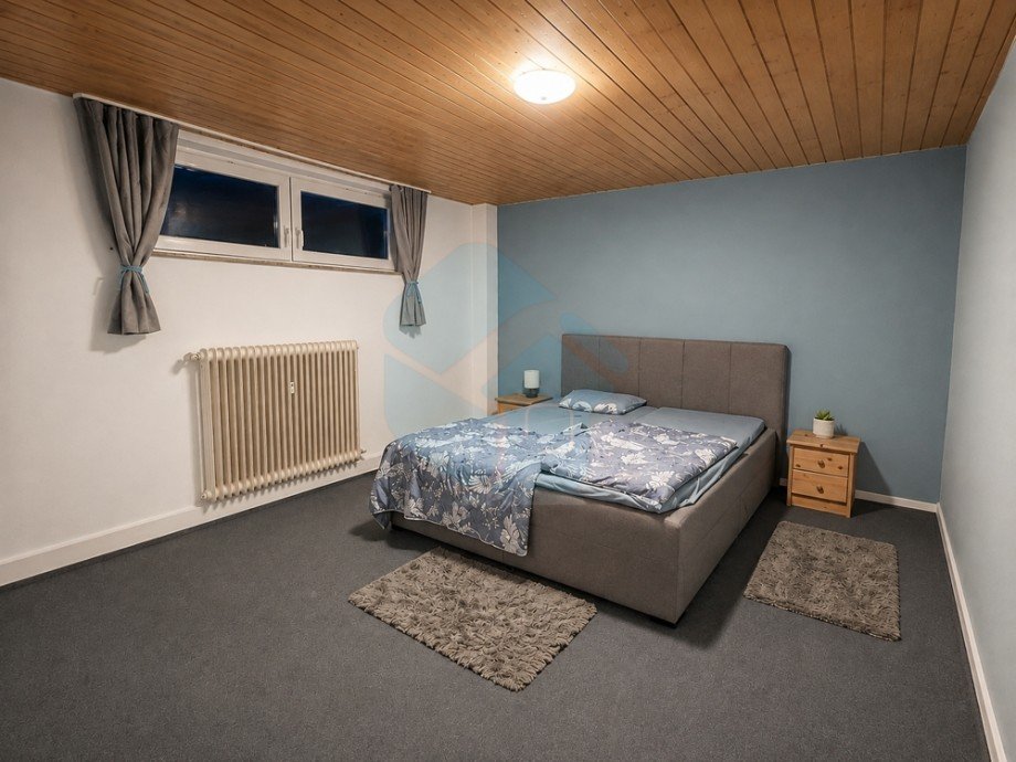 Schlafzimmer 1 UG Mehrfamilienhaus Butzbach / Griedel